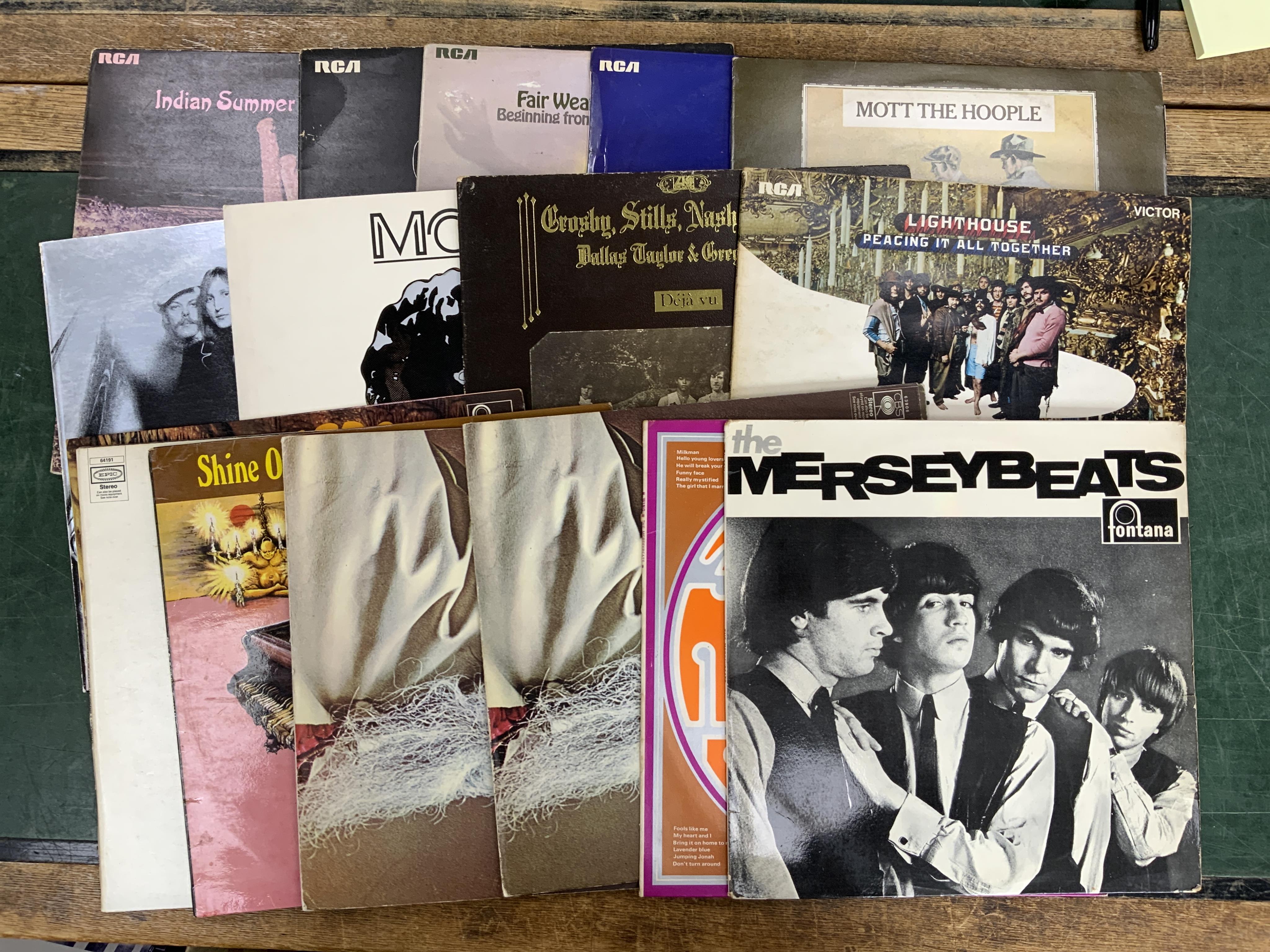 Sixteen LP record albums artists including; The Merseybeats, Moondog, Procol Harum, Spirit, The Troggs, Lighthouse, Crosby, Stills, Nash & Young, Mott the Hoople, Grapefruit, Fairweather, Aquila, Indian Summer. Condition